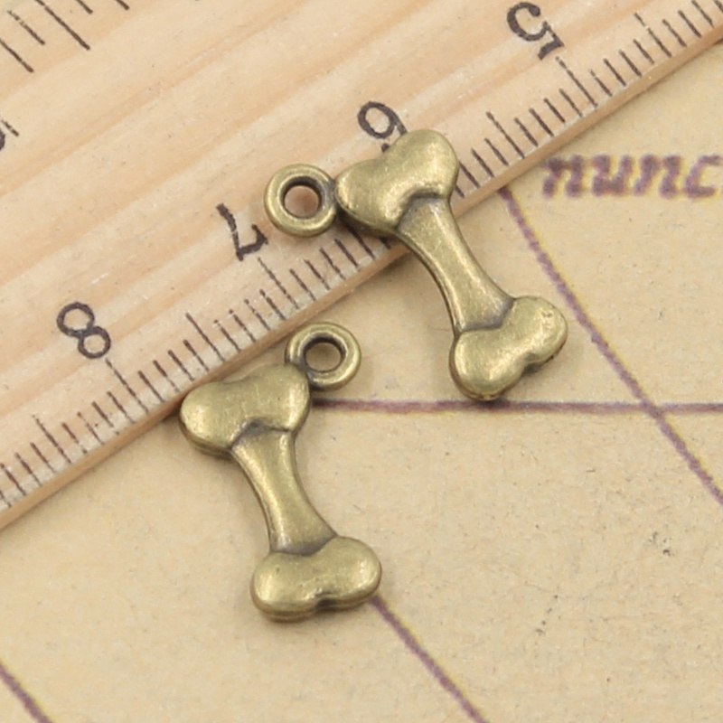 40pcs Charms Dog Bone 16x10mm  - огляд і ціна Vintage Fashion Finds